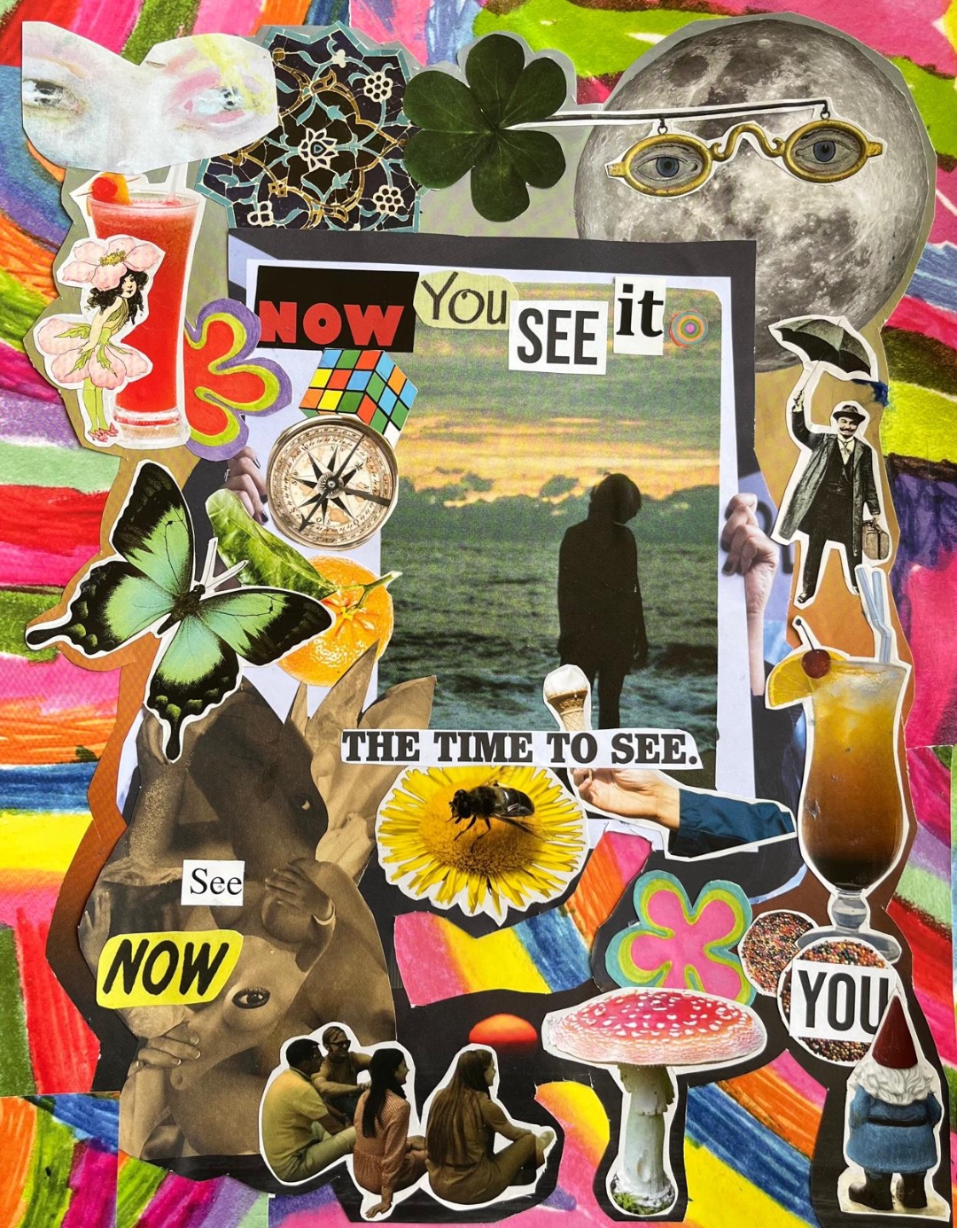 Now You See It - collage artwork featuring a figure silhouetted against the ocean at sunset, surrounded by butterflies, flowers, a compass, and psychedelic colours